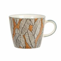 Tasse en faïence motif feuillage jaune moutarde